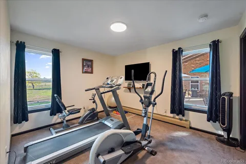 a view of a room with gym equipment