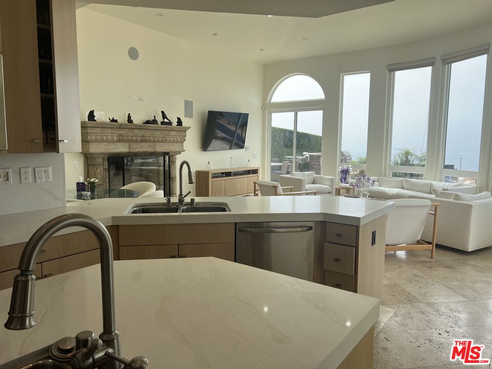 31280 Bailard Road Malibu, CA 90265 - Photo 38 of 51 a kitchen with a sink appliances and cabinets