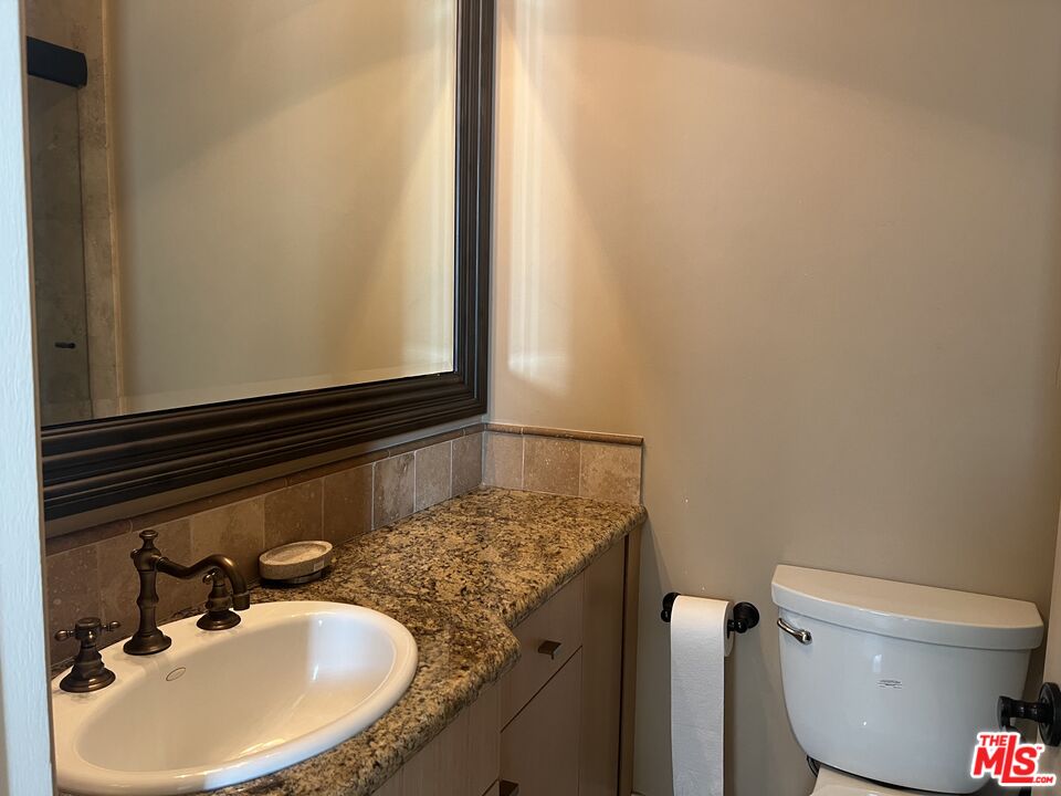 31280 Bailard Road Malibu, CA 90265 - Photo 39 of 51 a bathroom with a sink and a toilet
