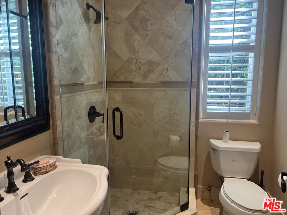 31280 Bailard Road Malibu, CA 90265 - Photo 41 of 51 a bathroom with a sink toilet and shower