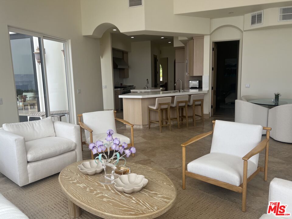 31280 Bailard Road Malibu, CA 90265 - Photo 44 of 51 a living room with furniture and dining table