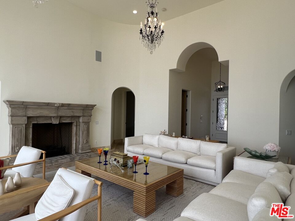 31280 Bailard Road Malibu, CA 90265 - Photo 47 of 51 a living room with furniture and a fireplace
