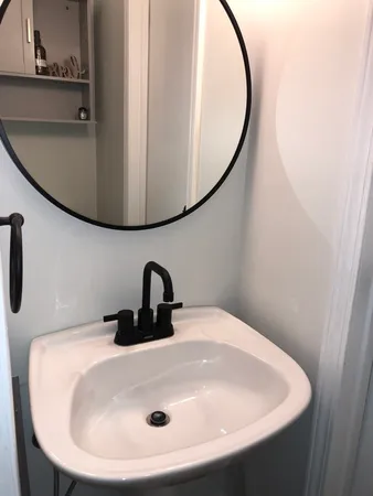 a close view of a sink in a bathroom
