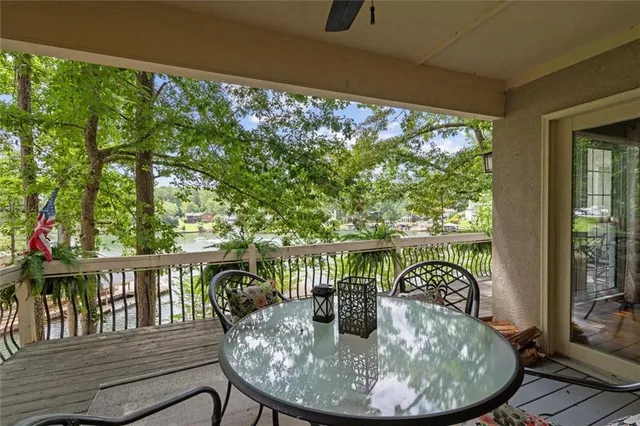 a bed room with a bed and a chandelier