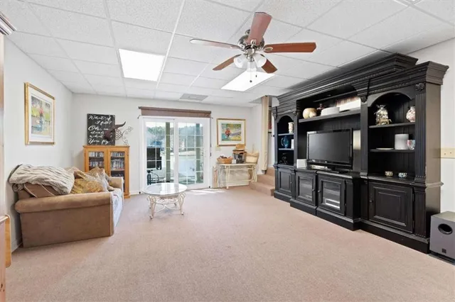 a lake view with a wooden bridge