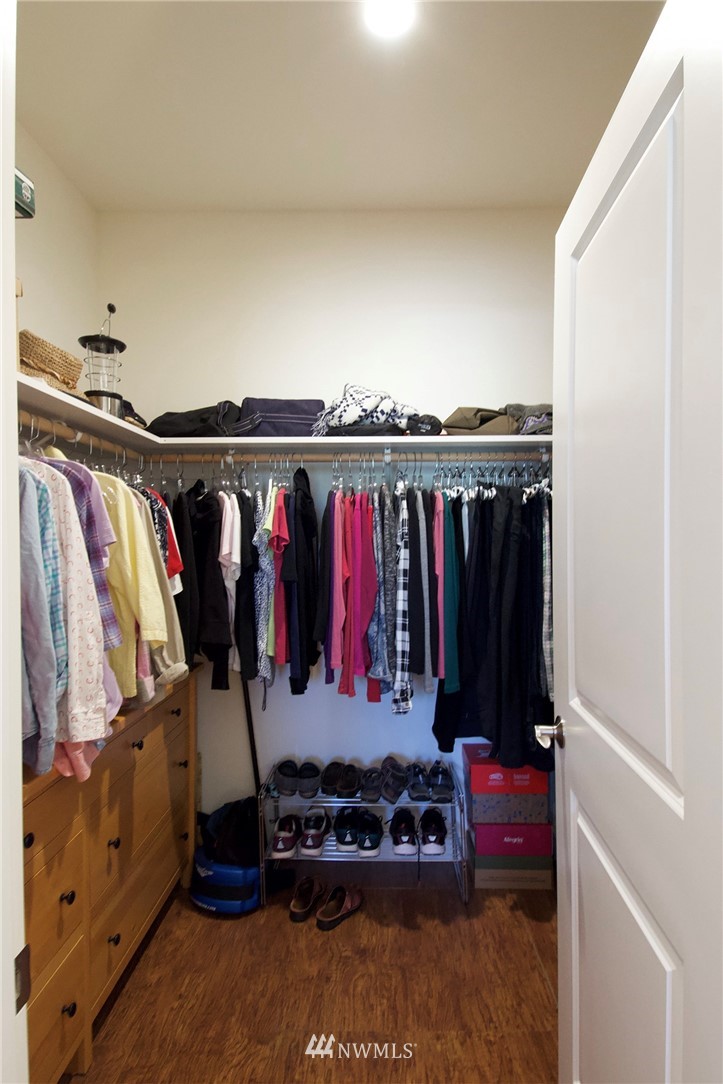 161 Stratus Loop Sequim, WA 98382 - Photo 20 of 34 a view of walk in closet with clothes and shoes