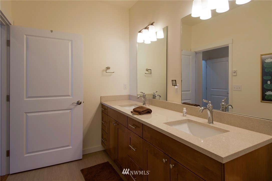 161 Stratus Loop Sequim, WA 98382 - Photo 23 of 34 a bathroom with a sink and a mirror
