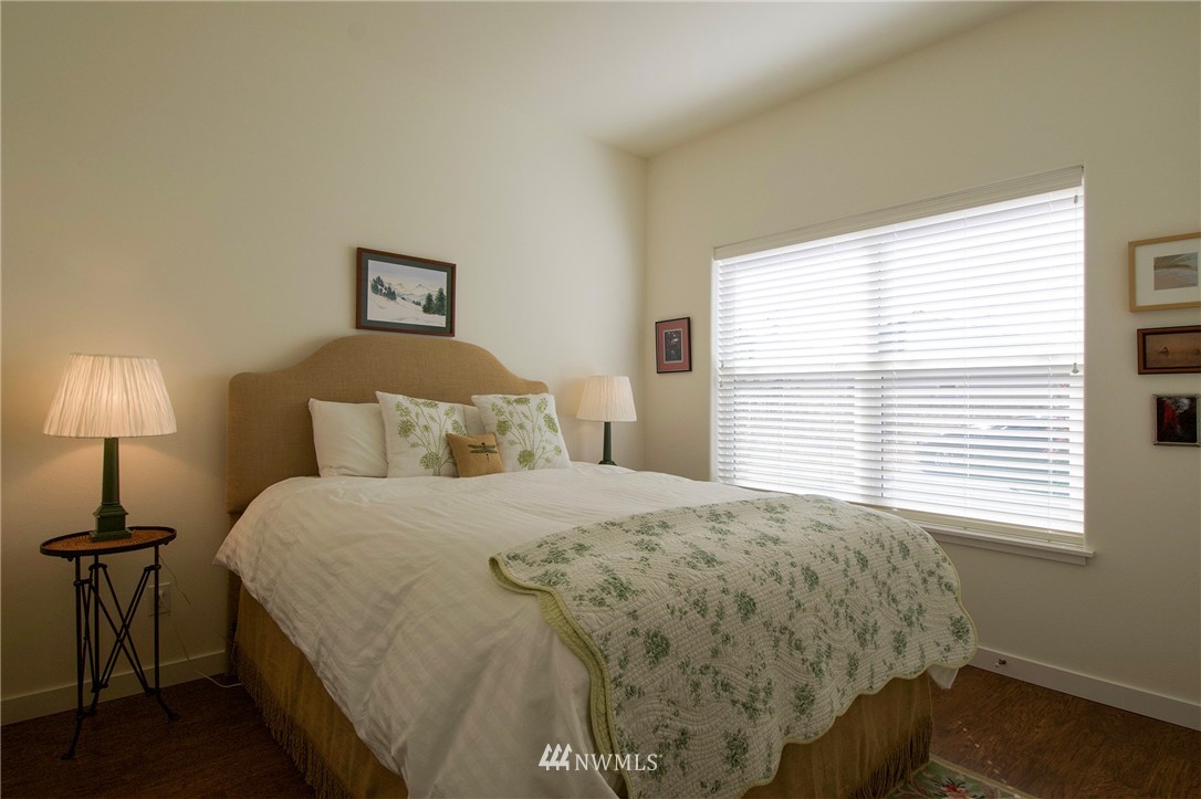 161 Stratus Loop Sequim, WA 98382 - Photo 27 of 34 a bedroom with a bed and a window