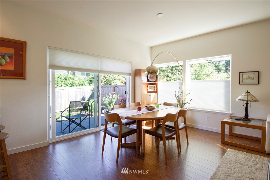 161 Stratus Loop Sequim, WA 98382 - Photo 5 of 34 a view of a dining room with furniture window and wooden floor