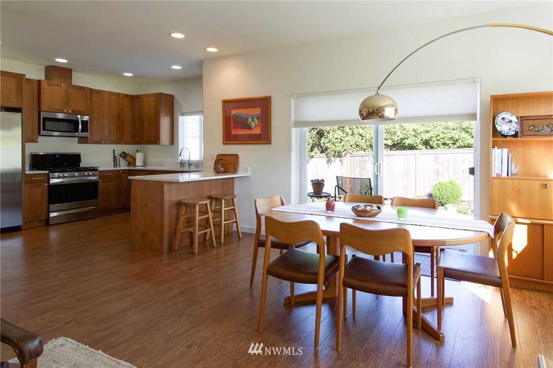 161 Stratus Loop Sequim, WA 98382 - Photo 6 of 34 a view of a dining room with furniture window and wooden floor