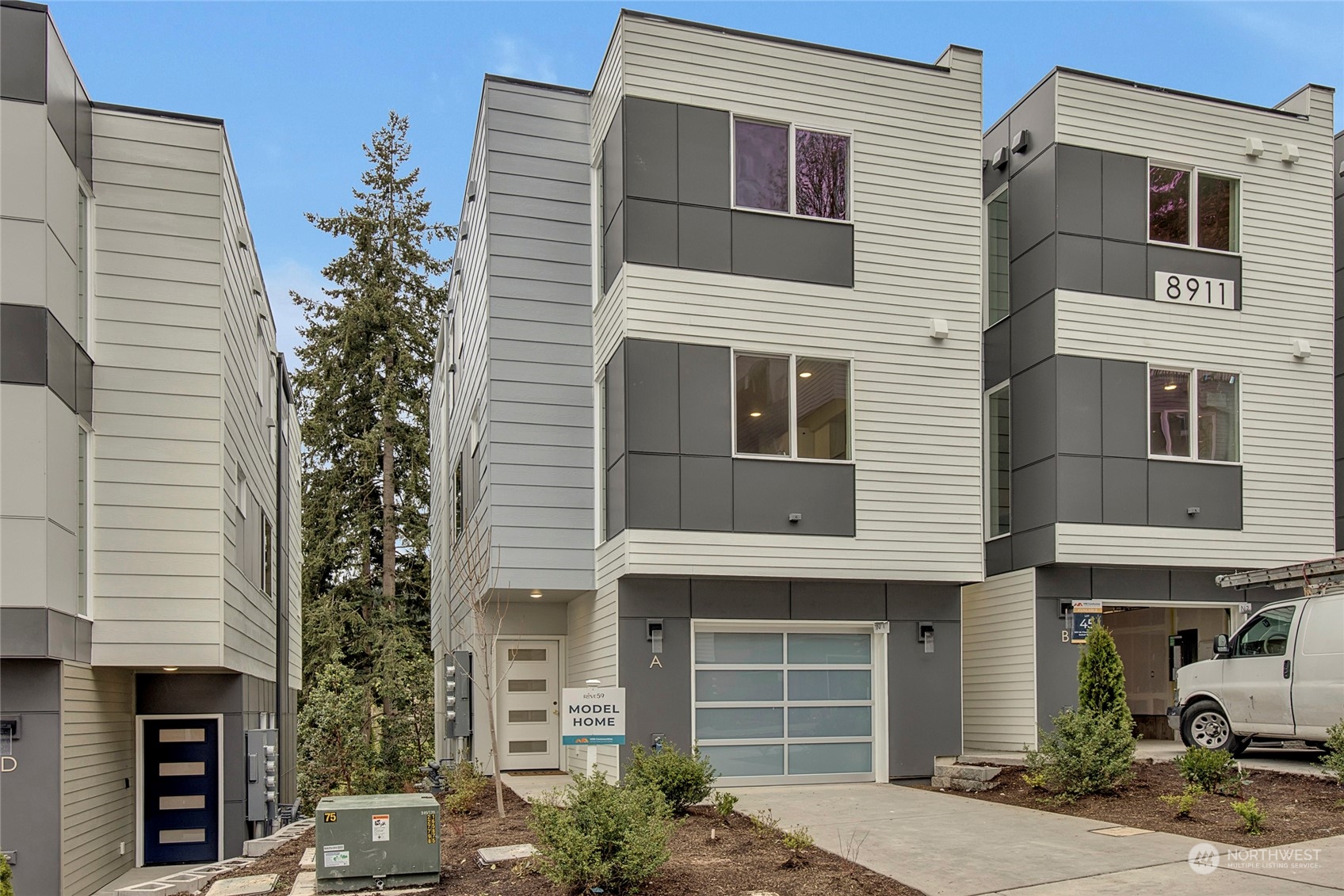 8911 Northeast 173rd Place, Unit A Bothell, WA 98011 - Photo 2 of 34 a front view of a house