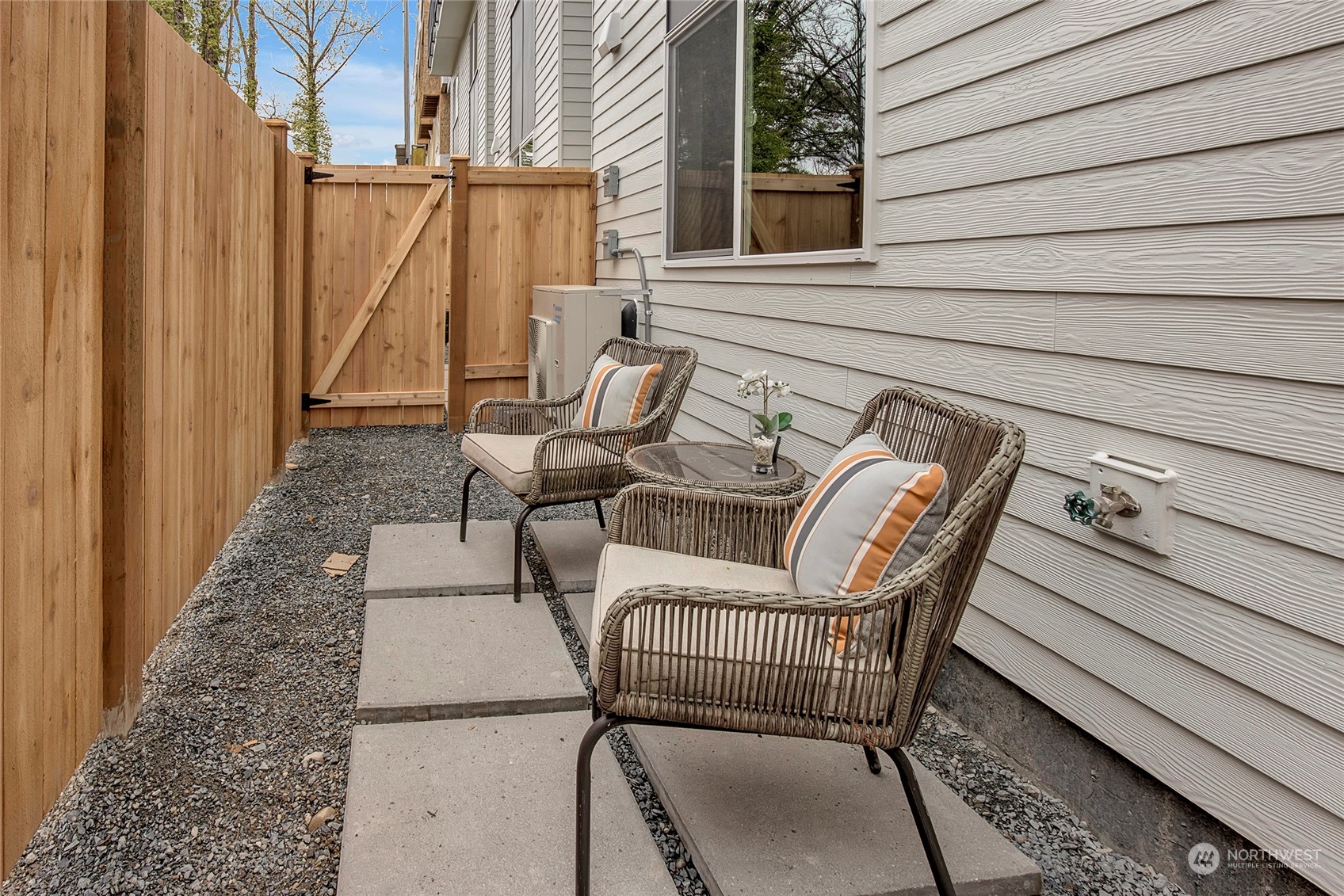 8911 Northeast 173rd Place, Unit A Bothell, WA 98011 - Photo 34 of 34 a view of a chair and tables in the balcony