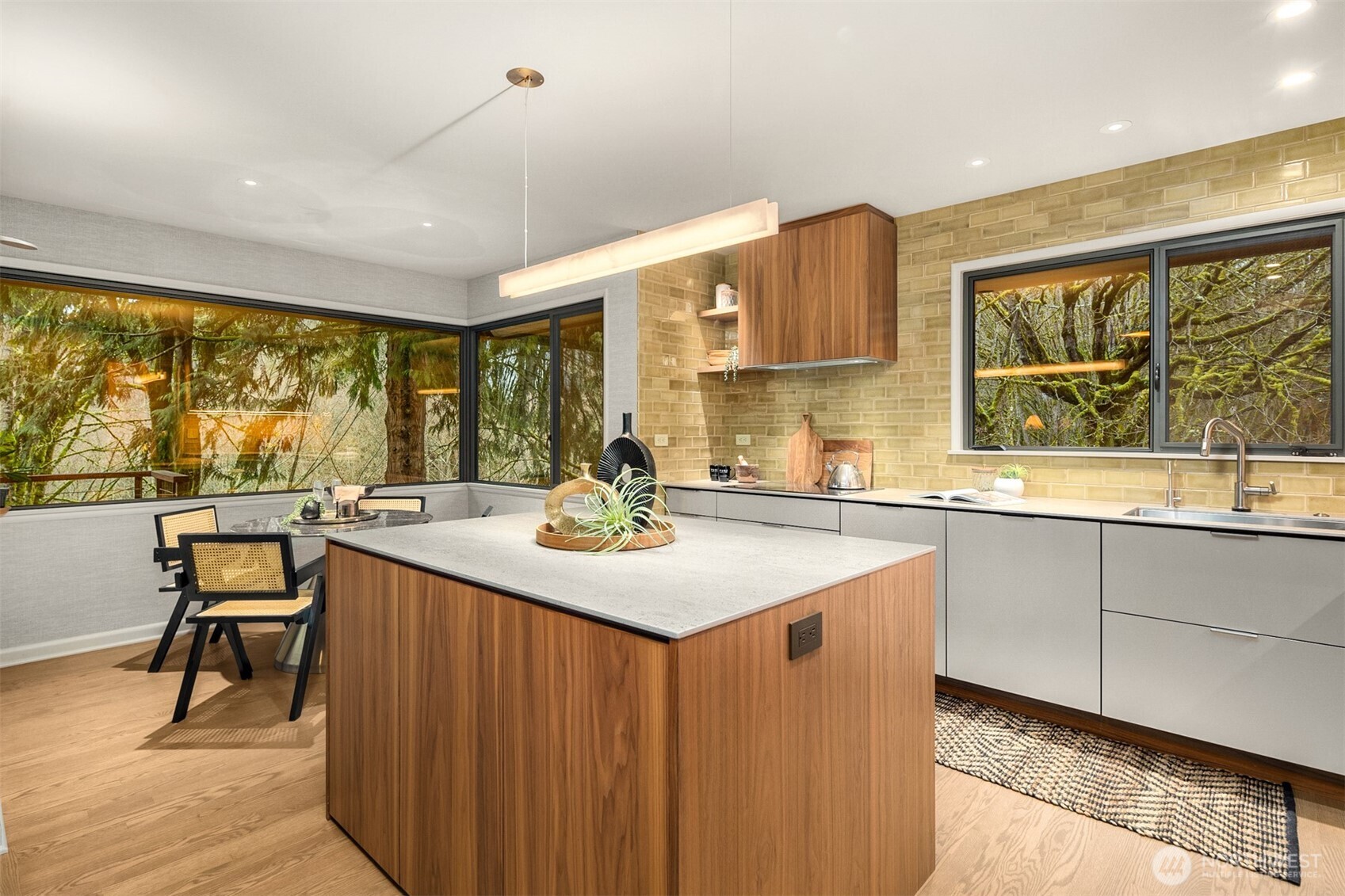 13739 Northwood Road Northwest Seattle, WA 98177 - Photo 12 of 35 a kitchen with stainless steel appliances granite countertop sink stove and wooden cabinets