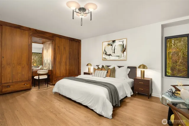 a bedroom with a bed and a dresser