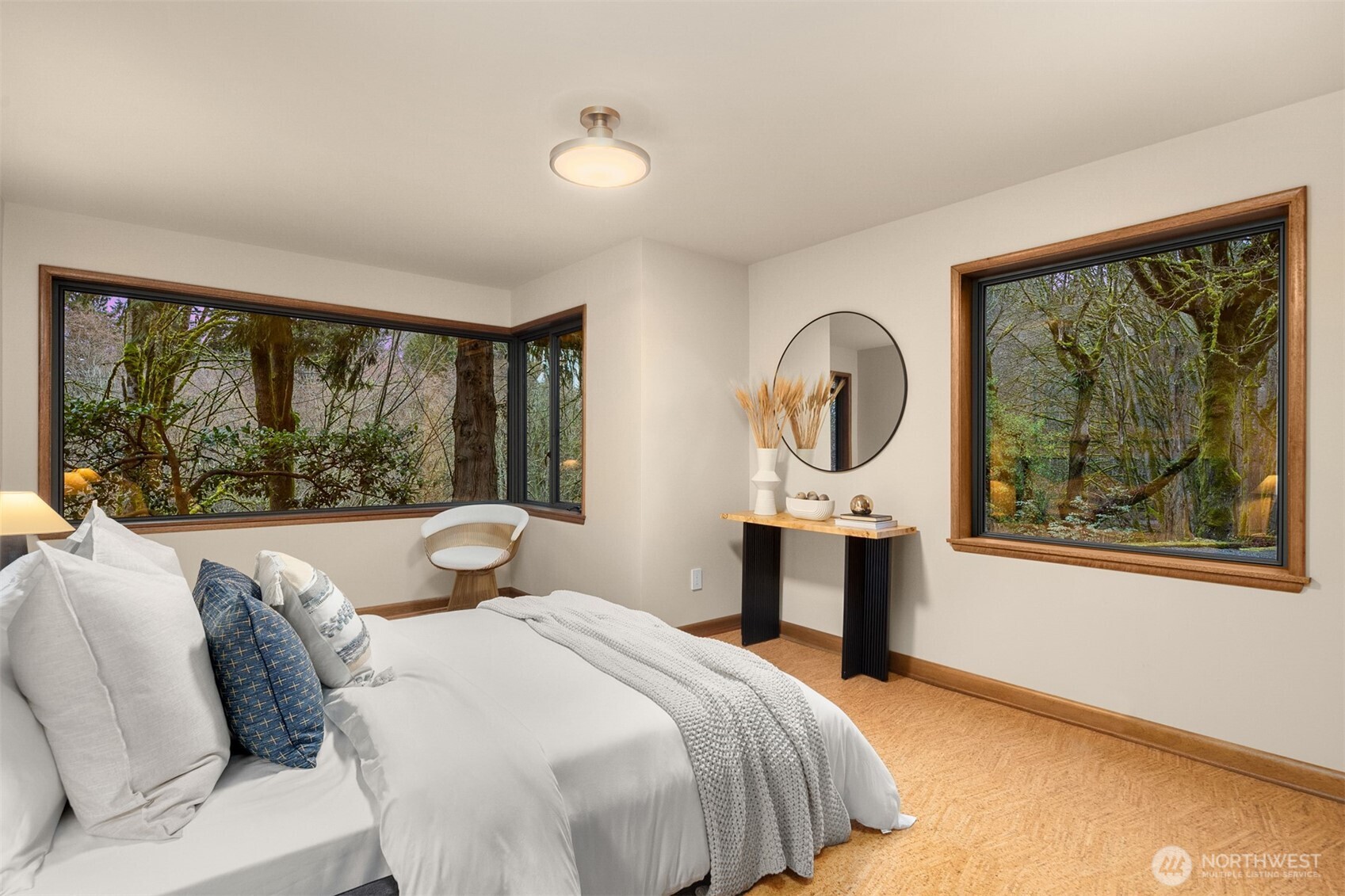 13739 Northwood Road Northwest Seattle, WA 98177 - Photo 22 of 35 a bedroom with a bed mirror and window