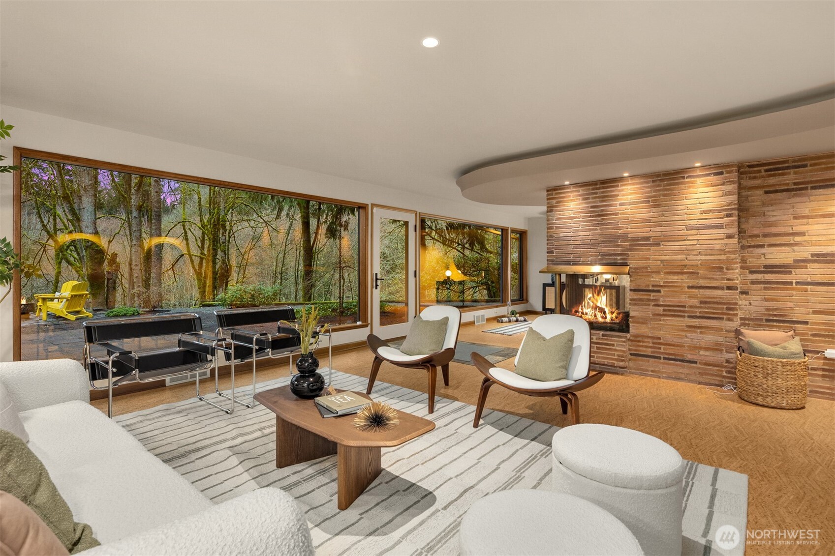 13739 Northwood Road Northwest Seattle, WA 98177 - Photo 25 of 35 a living room with patio furniture and a large window