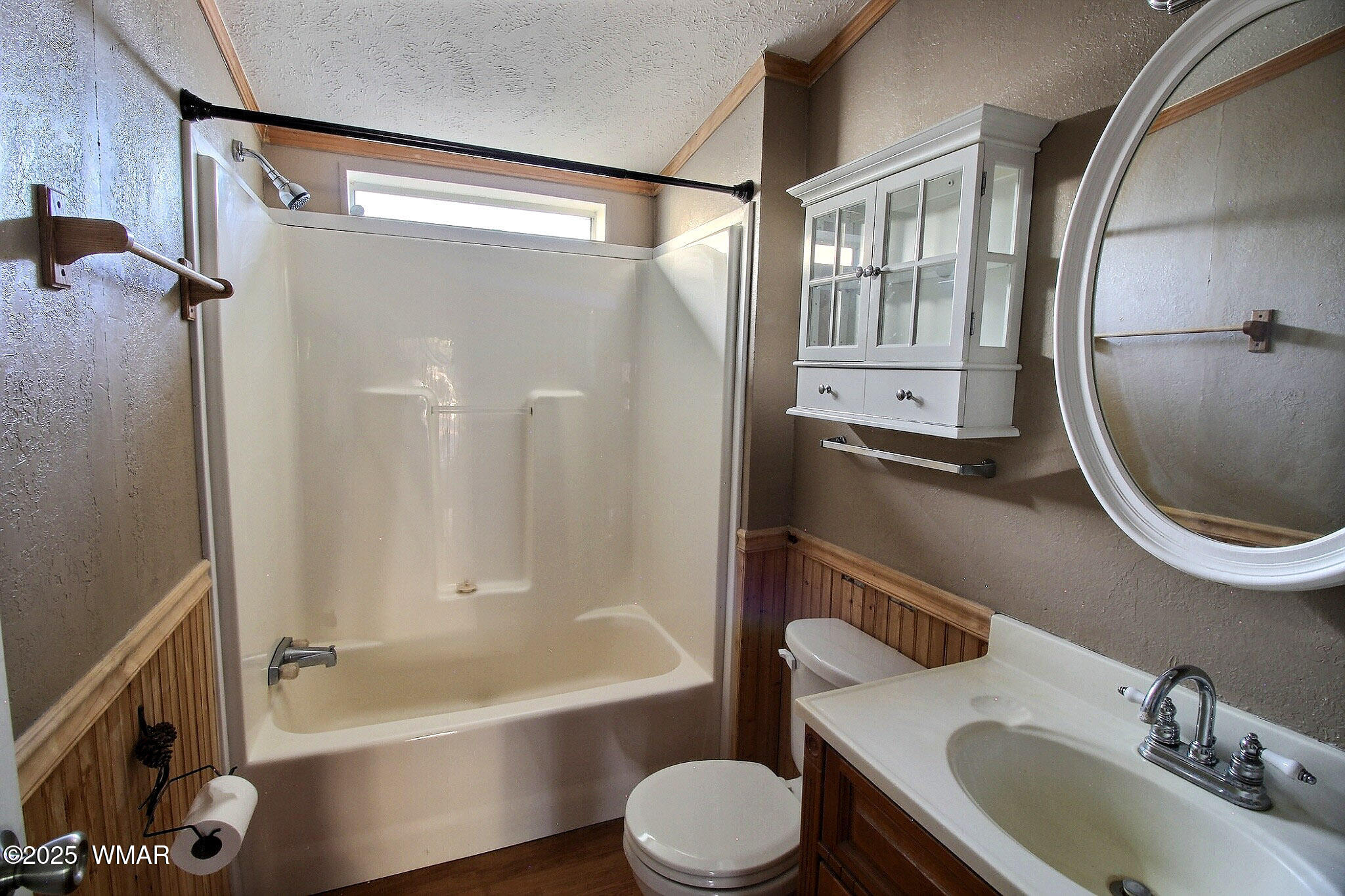 7803 Stokes Lane Show Low, AZ 85901 - Photo 12 of 25 a bathroom with a sink toilet and shower