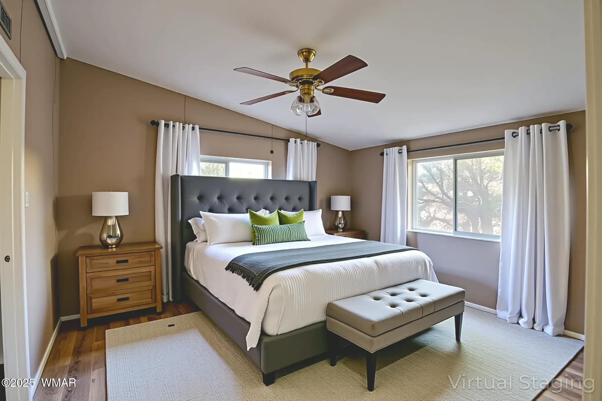 7803 Stokes Lane Show Low, AZ 85901 - Photo 6 of 25 a bedroom with a bed a window and a chandelier