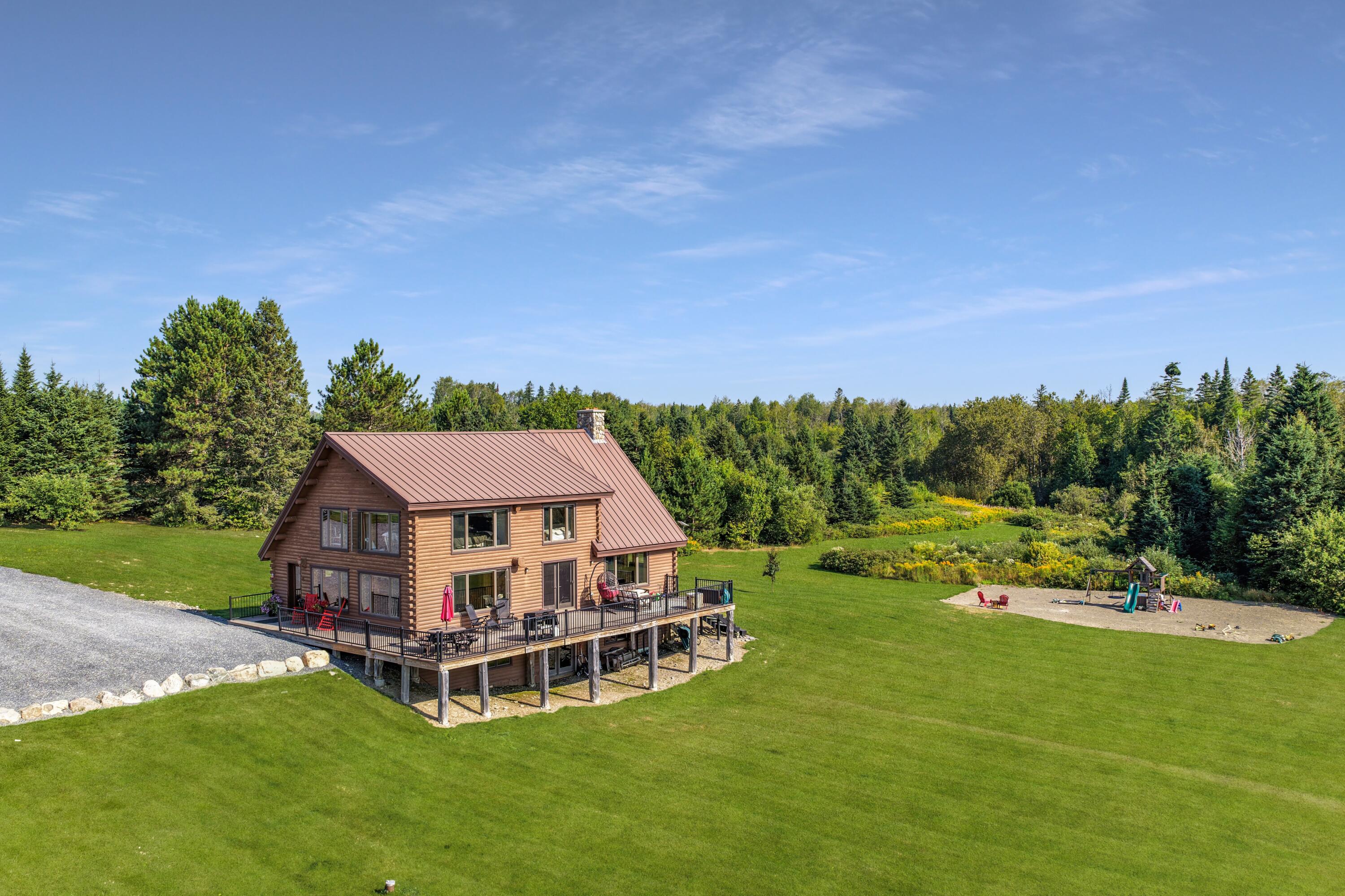 112 Schooland Road New Sweden, ME 04762 - Photo 1 of 64 DJI_20250813212103_0033_D