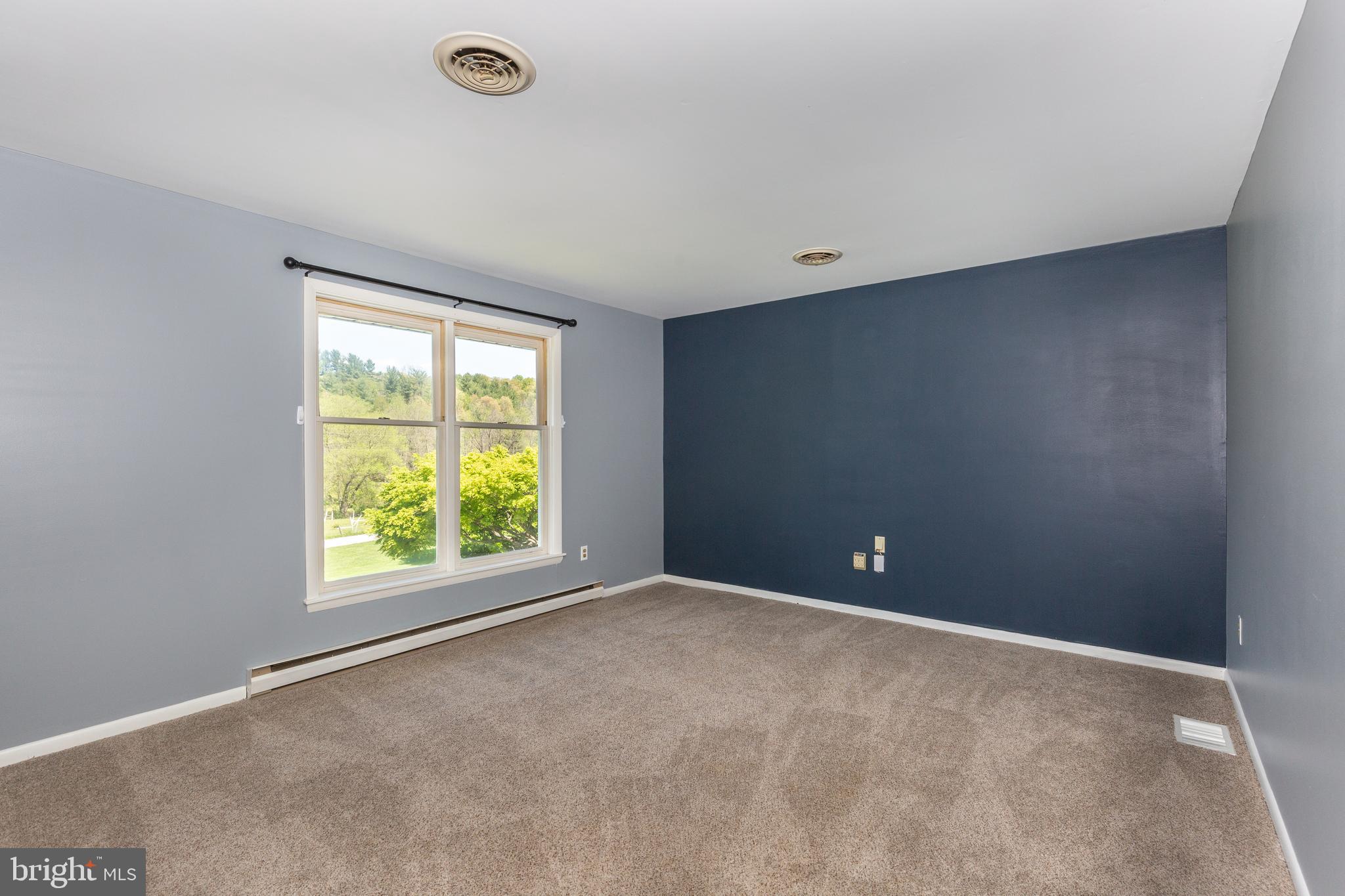 511 Leppo Road Westminster, MD 21158 - Photo 6 of 56 Front facing living room with pastoral views