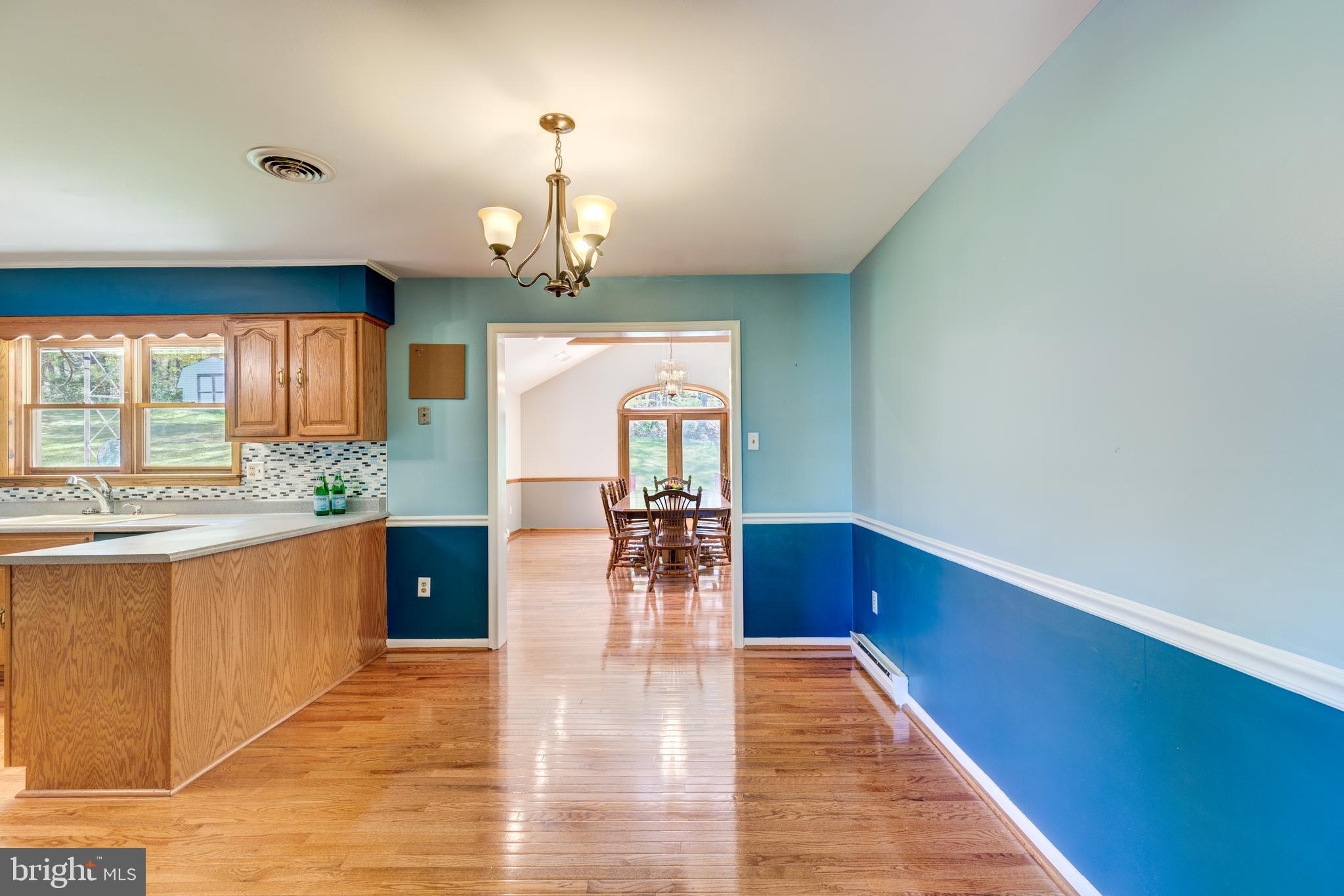 511 Leppo Road Westminster, MD 21158 - Photo 10 of 56 Gleaming hardwood floors in kitchen & addition