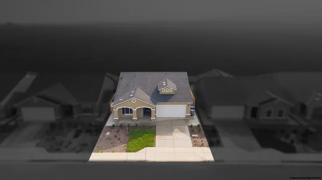 a kitchen with a table chairs refrigerator and microwave