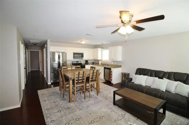 a view of a dining room with furniture