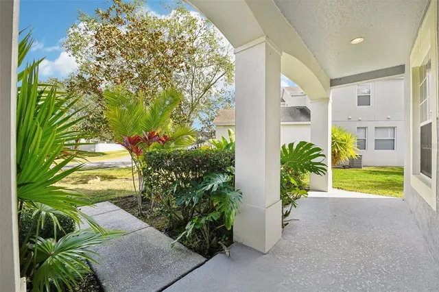a view of an entryway with garden