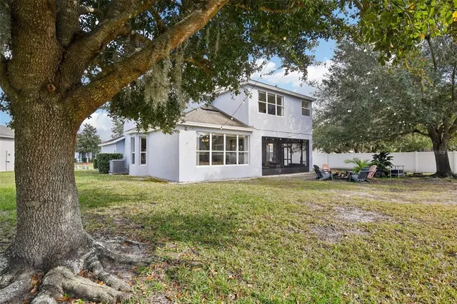 a view of outdoor space with yard and green space
