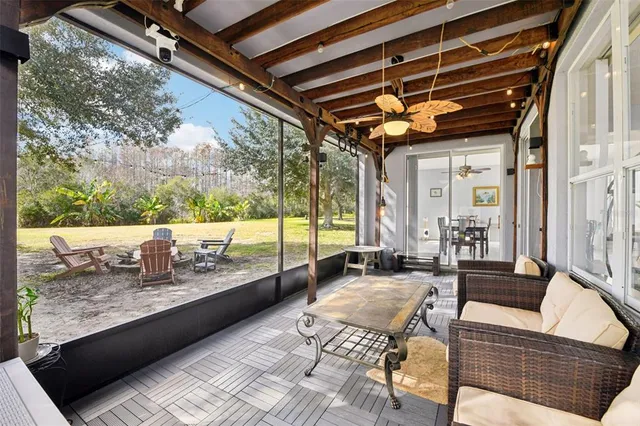 a outdoor living space with patio furniture and a potted plant