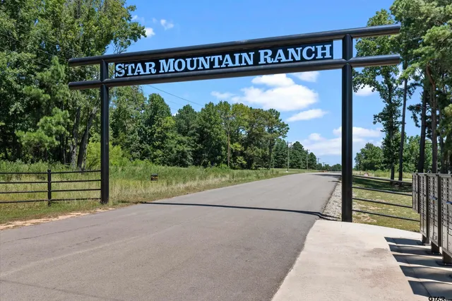 a view of a street with a sign on the road