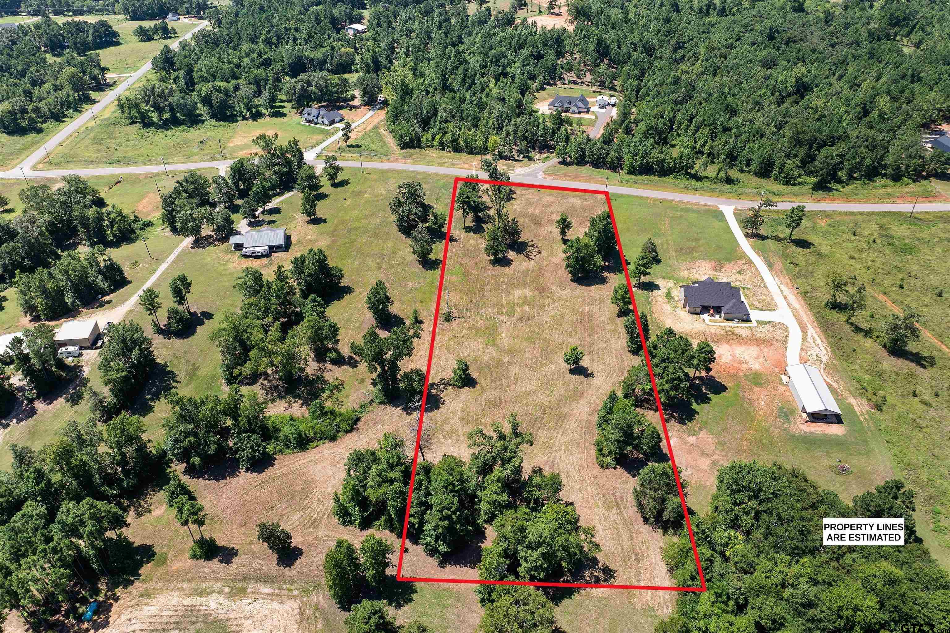 Tbd Tbd Ridgeline Loop Winona, TX 75792 - Photo 7 of 9 an aerial view of house with yard swimming pool and outdoor seating