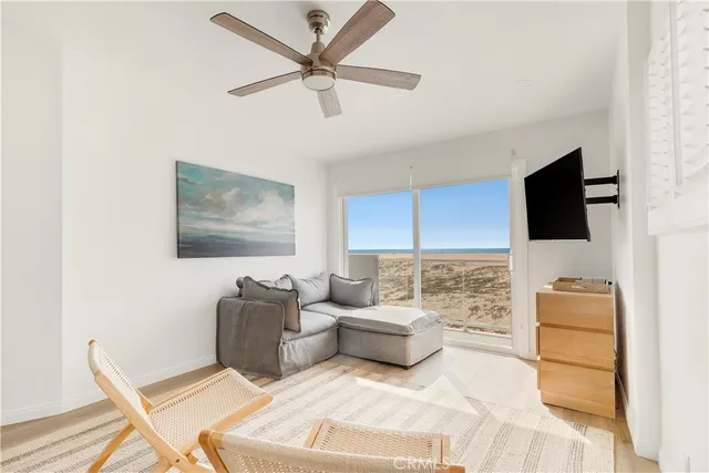 a bathroom with a granite countertop sink toilet and mirror