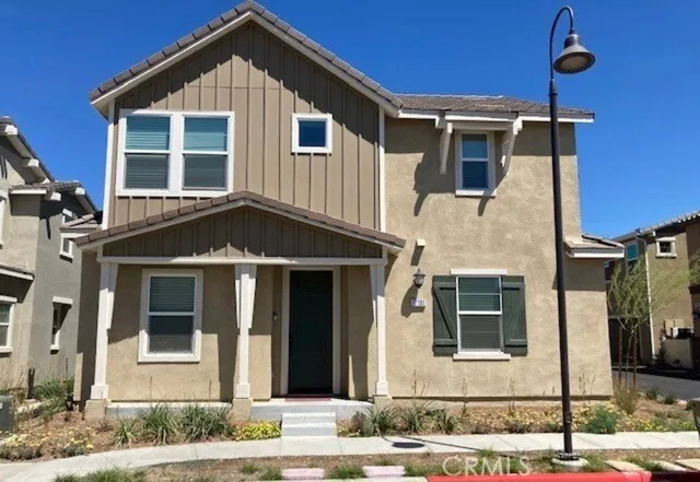 a front view of a house with a porch