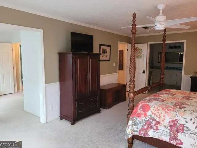 a bathroom with double sink and a mirror