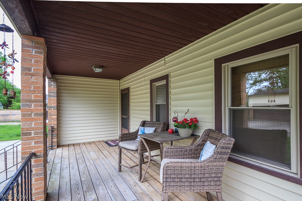 1700 Lyndhurst Road Lyndhurst, OH 44124 - Photo 3 of 35 Enjoy the rear covered porch rain or shine!