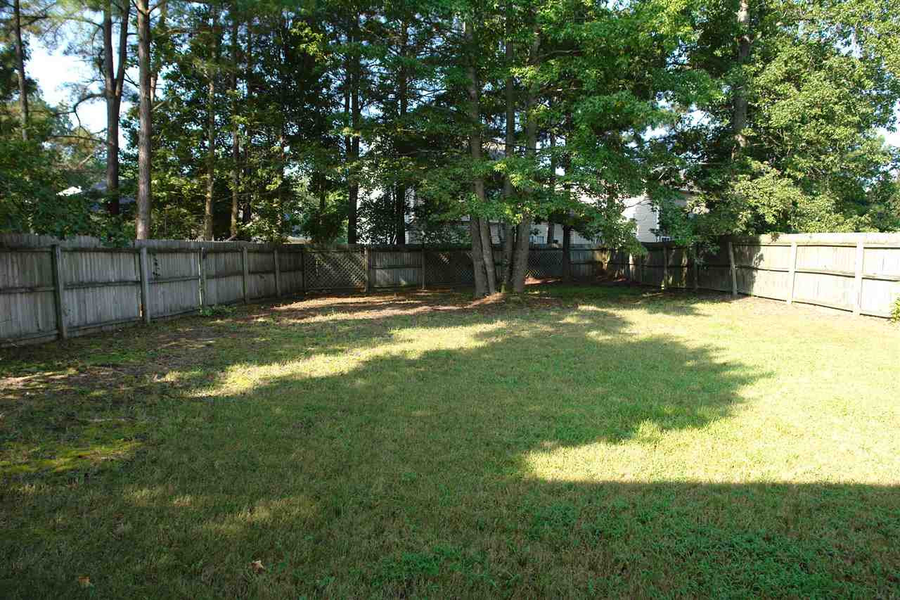 8317 Neuse Rapids Road Raleigh, NC 27616 - Photo 21 of 25 A beautiful back yard with shade and privacy. Hit the LOVE button on this one. Yard