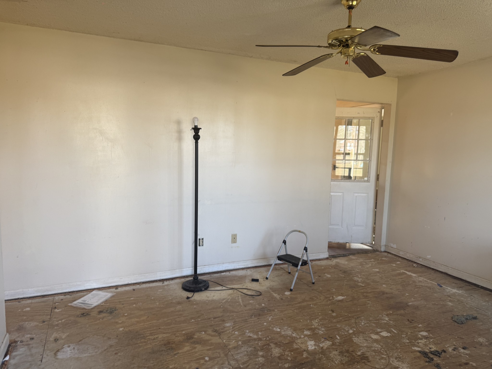 791 Delmont Church Road Cadiz, KY 42211 - Photo 3 of 8 a view of a room with rack on the wall and a window