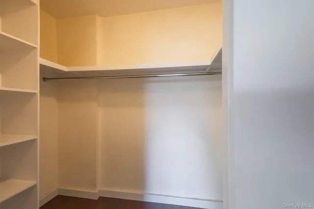 a kitchen with stainless steel appliances granite countertop a stove and a refrigerator