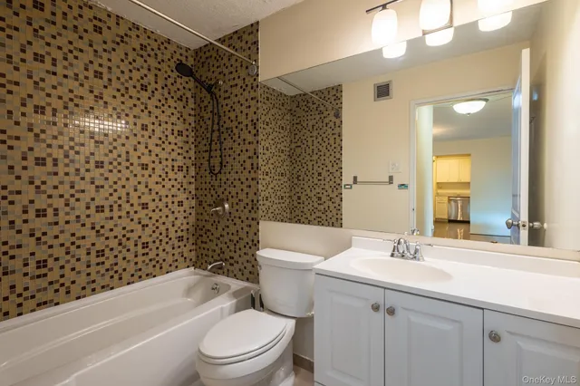 a view of balcony with wooden floor