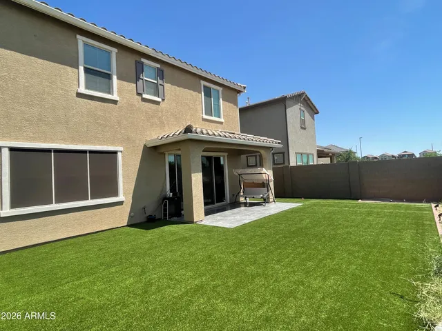 a view of an empty room with wooden walls