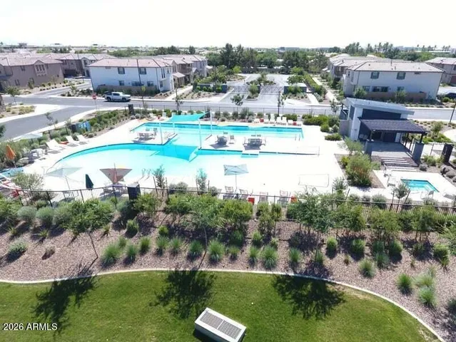 a view of a balcony with wooden floor