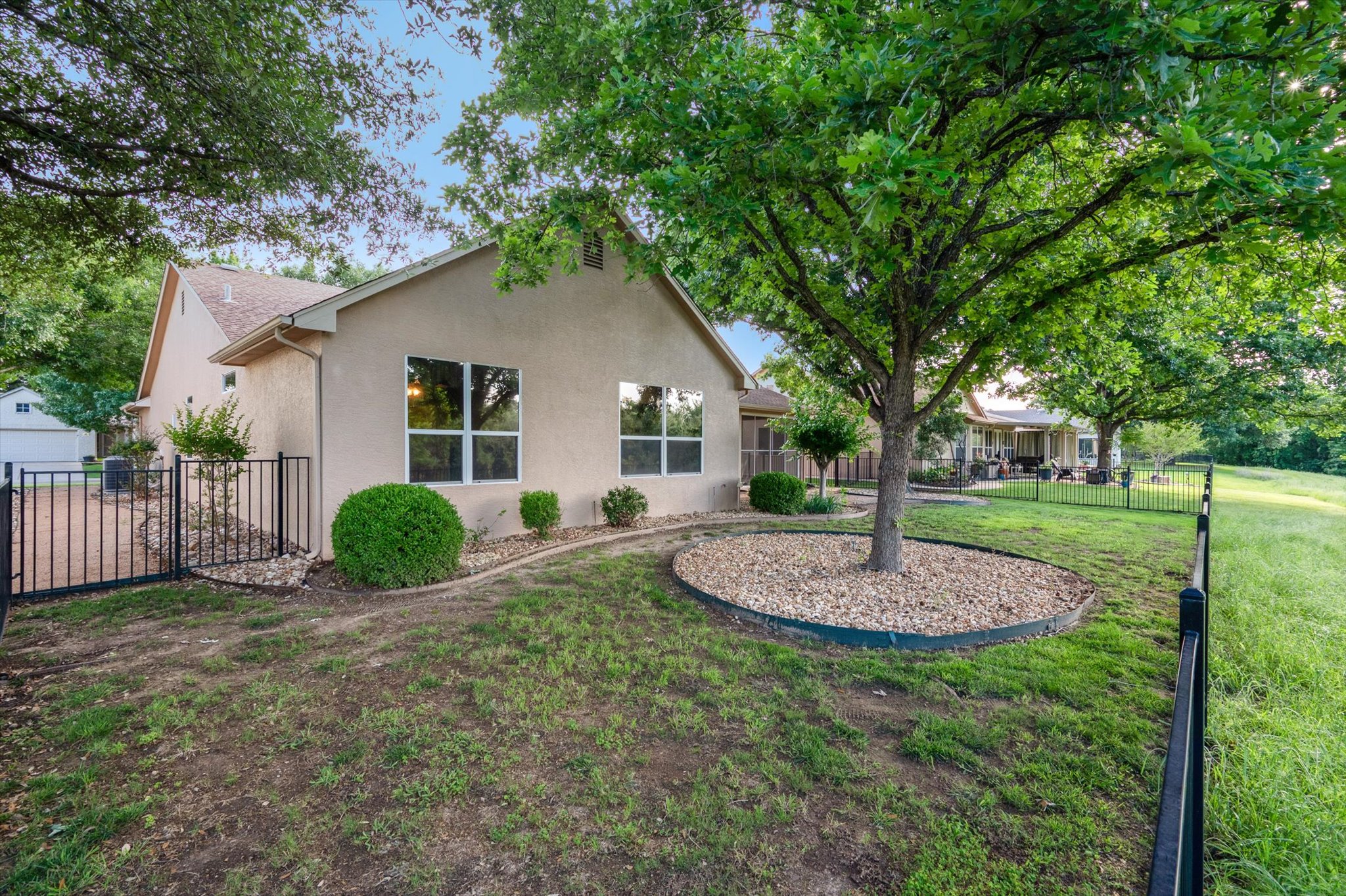 126 Trail Rider Way Georgetown, TX 78633 - Photo 25 of 30 a view of a house with a yard and large tree