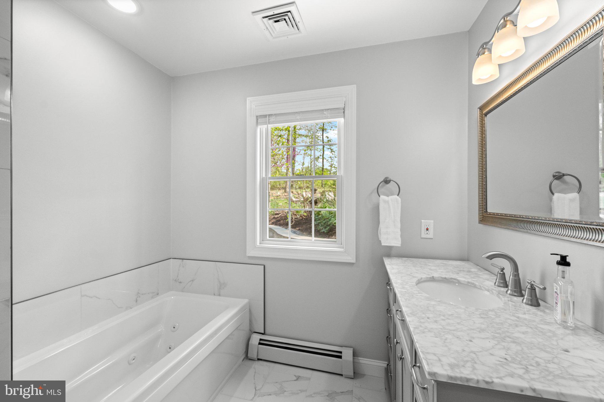 418 Church Road Hatfield, PA 19440 - Photo 26 of 53 Serene bathroom with natural light.