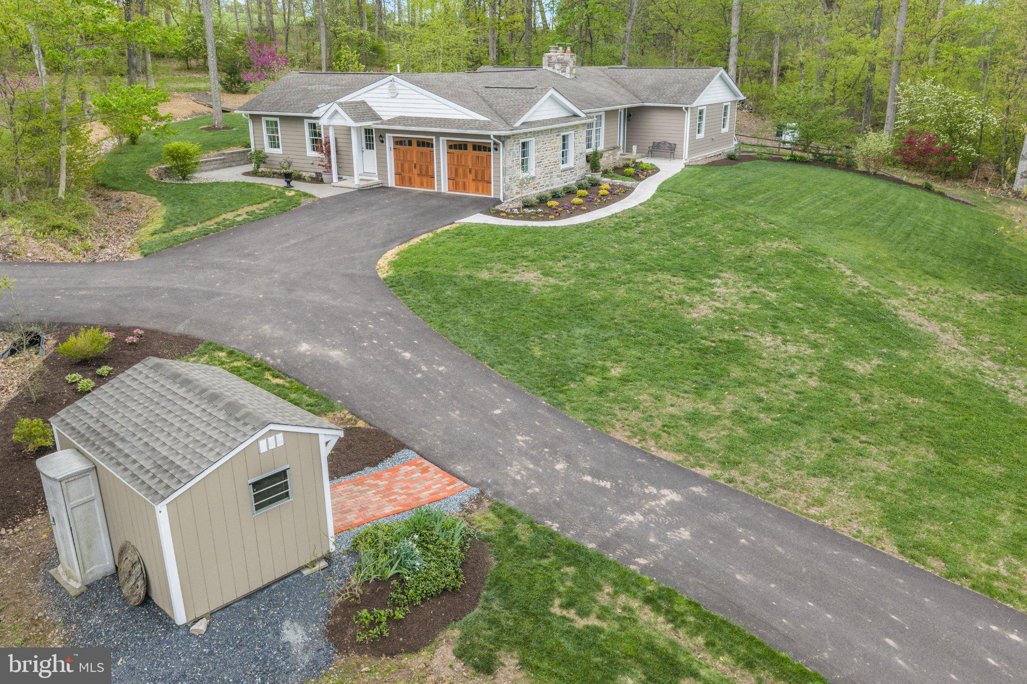 418 Church Road Hatfield, PA 19440 - Photo 45 of 53 Charming home nestled in lush greenery.