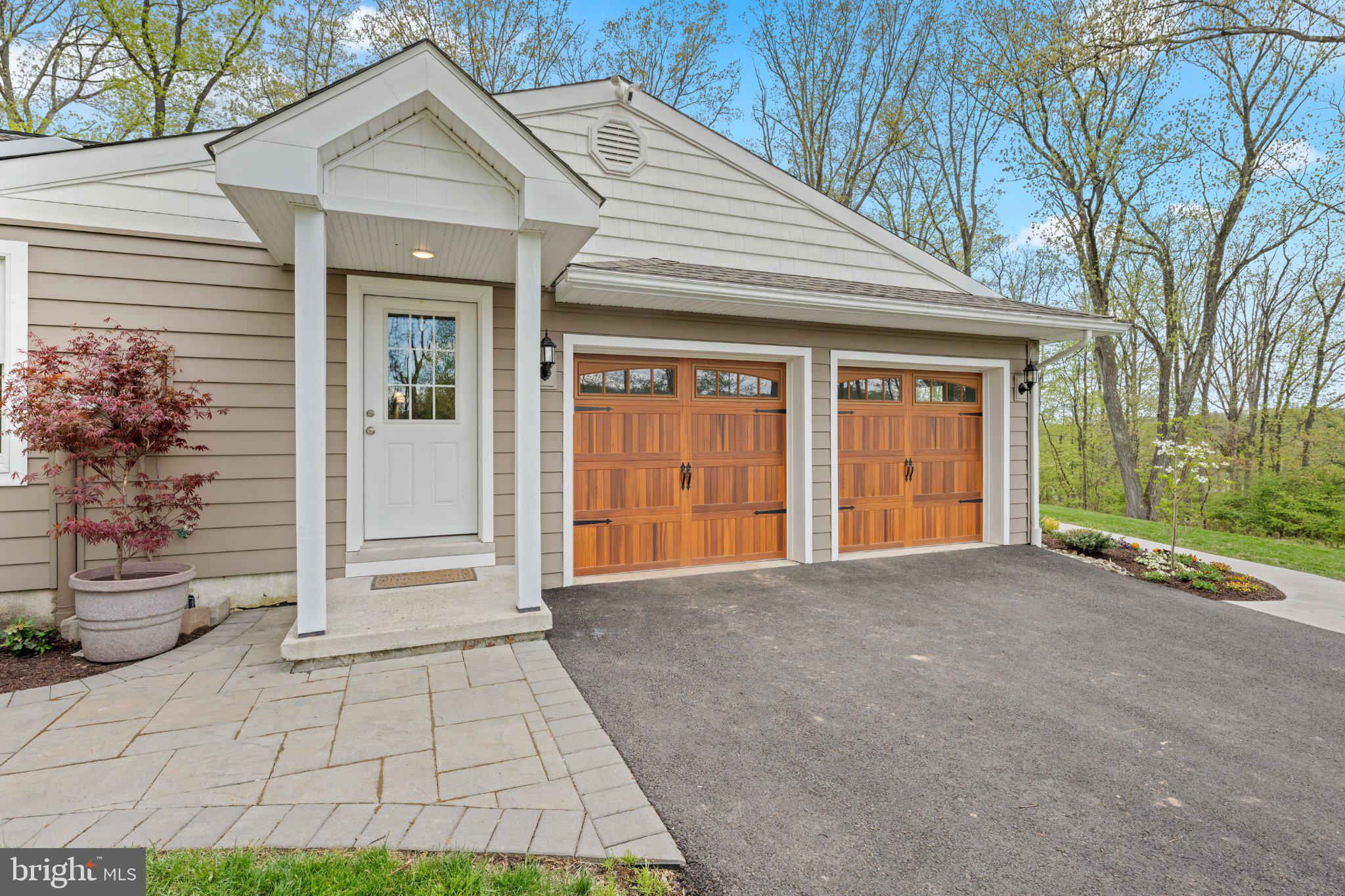 418 Church Road Hatfield, PA 19440 - Photo 6 of 53 Charming entrance with elegant garage doors.