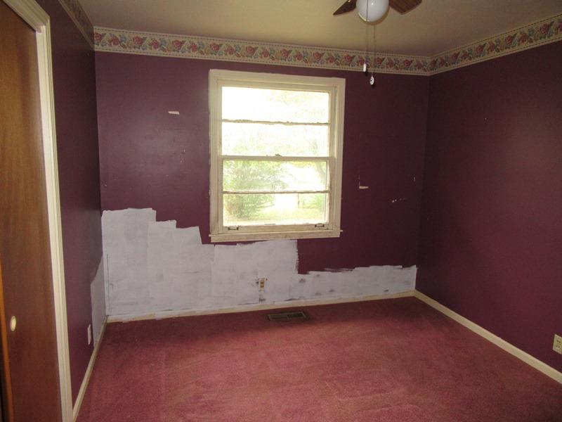 506 Wren Road Clarksville, TN 37040 - Photo 5 of 8 a view of an empty room with a window