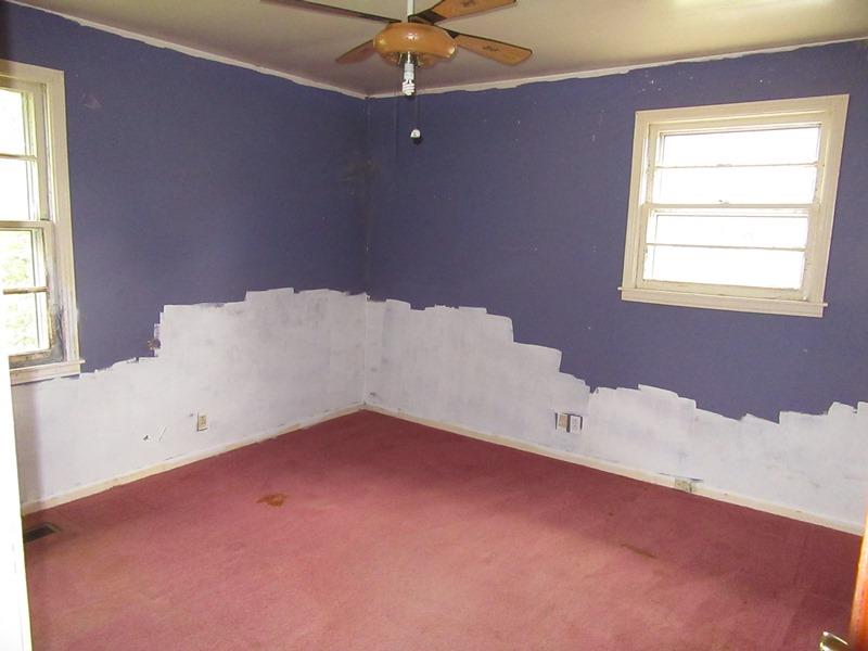 506 Wren Road Clarksville, TN 37040 - Photo 7 of 8 an empty room with a window and a ceiling fan