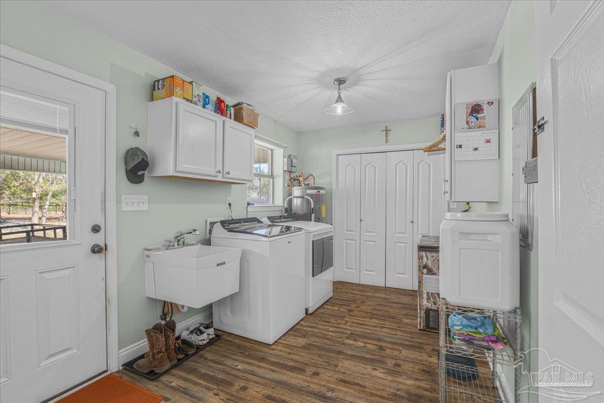 1766 Narrow Road Jay, FL 32565 - Photo 13 of 55 a kitchen with a sink appliances and cabinets