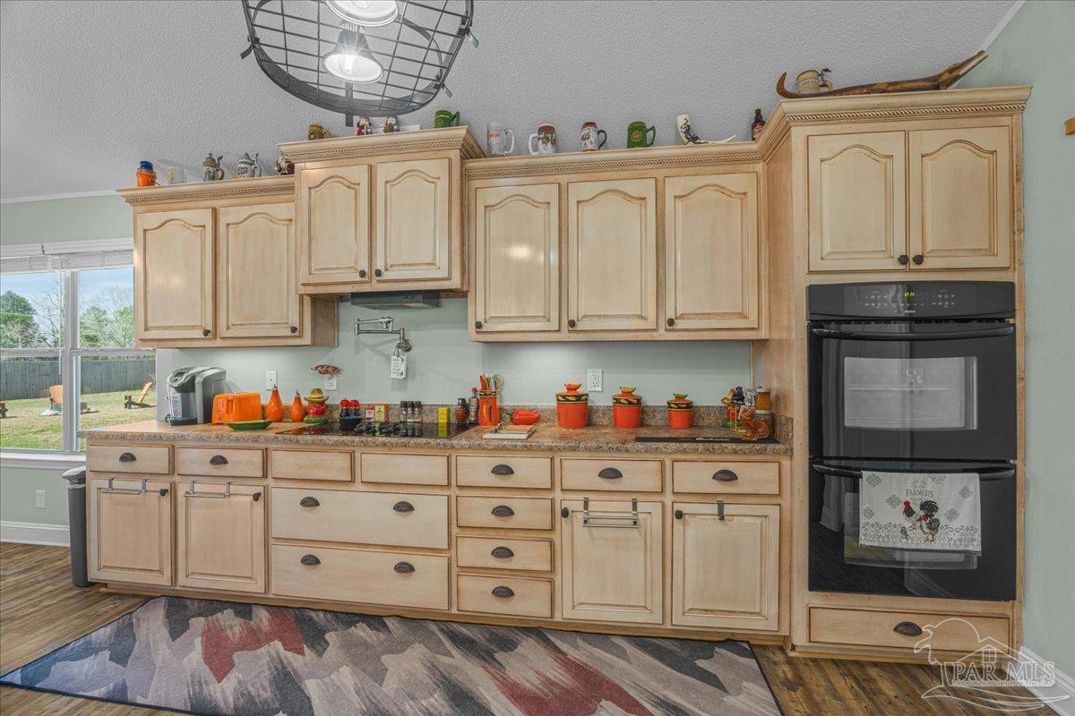 1766 Narrow Road Jay, FL 32565 - Photo 18 of 55 a kitchen with stainless steel appliances granite countertop a refrigerator and cabinets